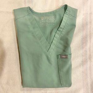 FIGS Catarina one pocket scrub top. Not sure of the color, it’s a light green.